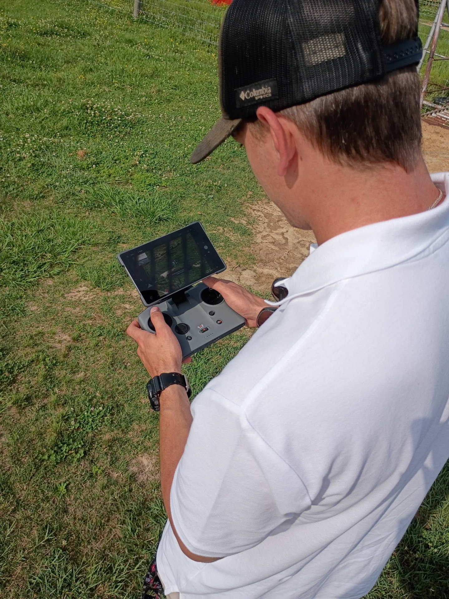 Christian Gotte reviewing live aerial footage on the AIS flight controller